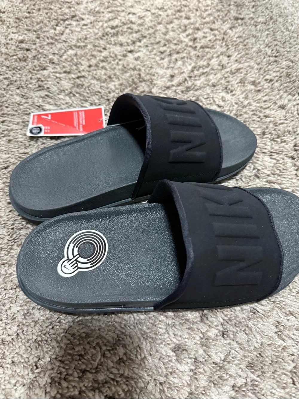 Nike Black Slide Sandals with Embossed Logo